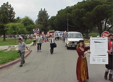 The Traitors play live on a flatbed truck, through a solar powered PA, in an anti-fraudulent energy crisis, anti-Bush demonstration, Long Beach CA, July 4, 2001 - CLICK FOR NEXT IMAGE